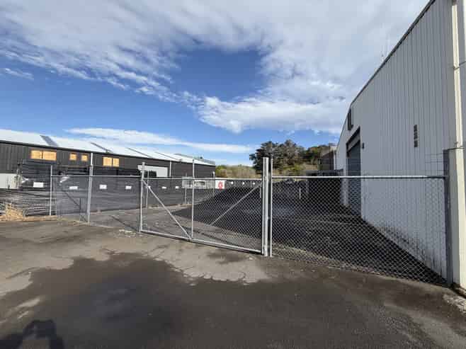 Large central warehouse with ample yard