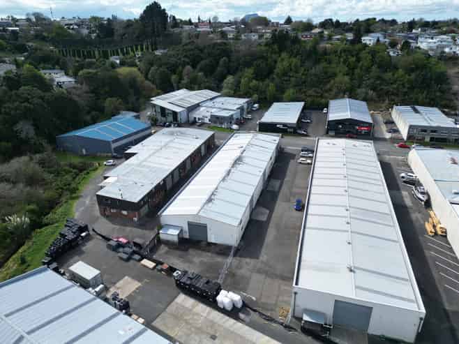 Large central warehouse with ample yard