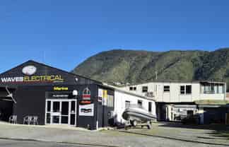 Two affordable light industrial, or storage units
