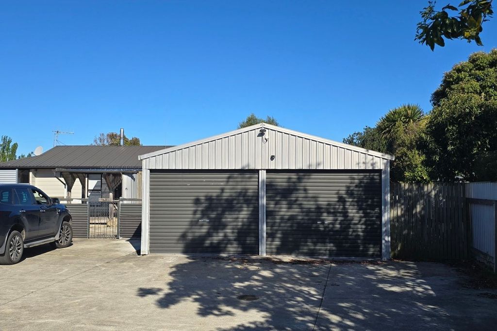 Clive,Nice sunny three Bedroom,large garage 2
