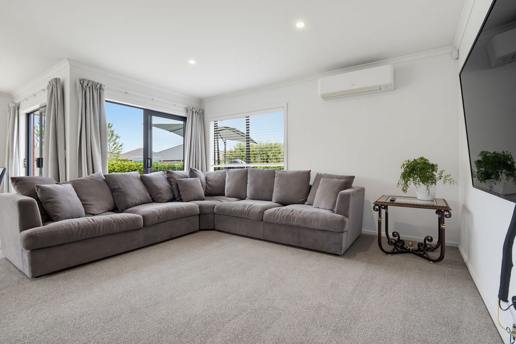 Sunlit Family Living with Deckside Appeal 3