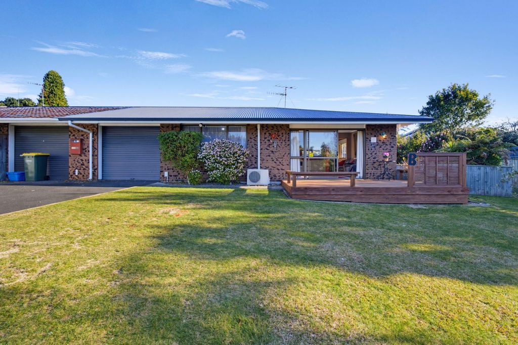 Sunny Two-Bedroom Home with Spacious Deck 1