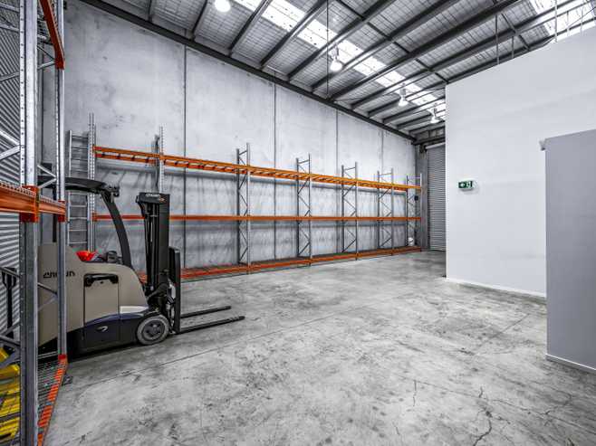 Tilt-slab industrial with dual roller doors