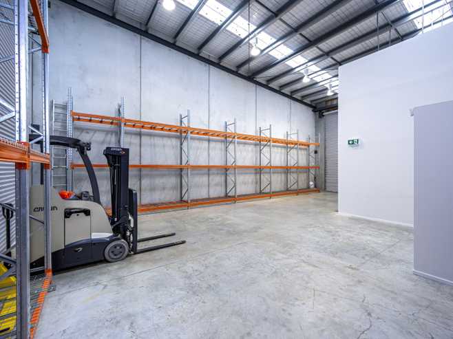 Tilt-slab industrial with dual roller doors
